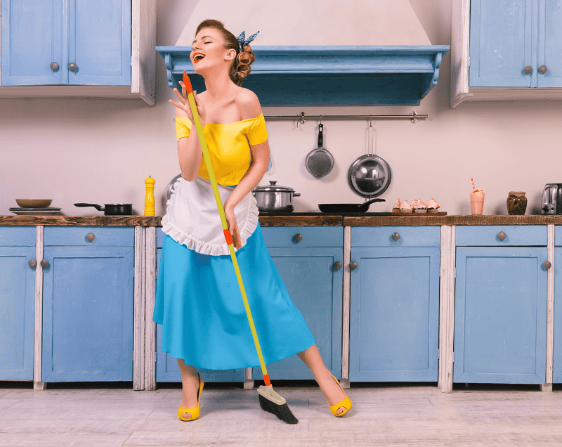 woman from the 1950's happy as can be to do all the cleaning and cooking
